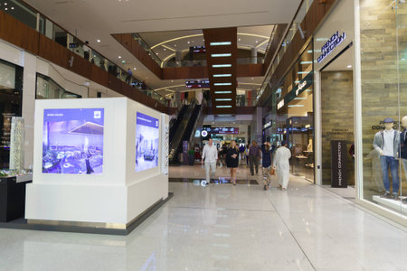 DUBAI - OCTOBER 13: The Dubai Mall linterior on October 13, 2014 in Dubai, UAE. The Dubai Mall located in Dubai, it is part of the 20-billion-dollar Downtown Dubai complex, and includes 1,200 shops.のeditorial素材