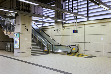 HONG KONG - APRIL 03, 2015: The Mass Transit Railway station. MTR is the rapid transit railway system in Hong Kong. It is one of the most profitable systems in the worldのeditorial素材