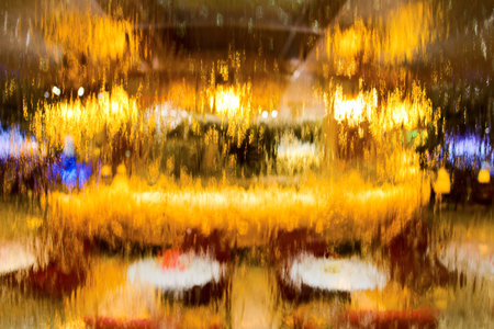Food court in business lounge through glass wall with waterfallのeditorial素材