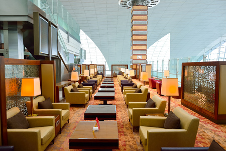 DUBAI - JUNE 22, 2015: Emirates business class lounge interior. Emirates is the largest airline in the Middle East. It is an airline based in Dubai, United Arab Emirates.のeditorial素材