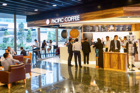 HONG KONG, CHINA - MAY 05, 2015: Pacific Coffee cafe interior. Pacific Coffee Company is a Pacific Northwest U.S.- style coffee shop group originating from Hong Kong, with a few outlets in China, Singapore and Malaysiaのeditorial素材