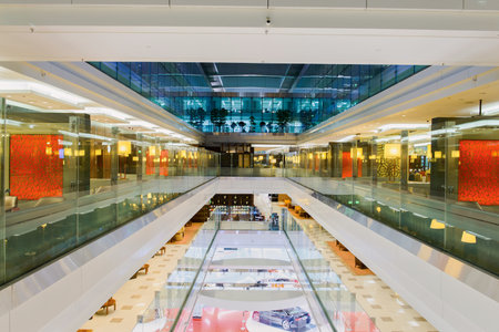 DUBAI, UAE - APRIL 18, 2014: airport interior. Dubai International Airport is an international airport serving Dubai. It is a major airline hub in the Middle East, and is the main airport of Dubai.のeditorial素材