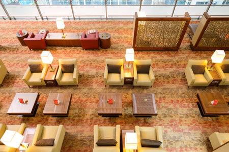 DUBAI - SEPTEMBER 08, 2015: Emirates business class lounge interior. Emirates is the largest airline in the Middle East. It is an airline based in Dubai, United Arab Emirates.のeditorial素材