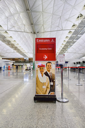 HONG KONG - SEPTEMBER 09, 2015: Emirates check-in counter design. Emirates is the largest airline in the Middle East. It is an airline based in Dubai, UAE.のeditorial素材
