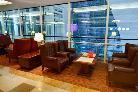 DUBAI - SEPTEMBER 08, 2015: Emirates business class lounge interior. Emirates is the largest airline in the Middle East. It is an airline based in Dubai, United Arab Emirates.のeditorial素材
