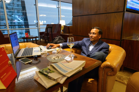 DUBAI - SEPTEMBER 08, 2015: Emirates business class lounge interior. Emirates is the largest airline in the Middle East. It is an airline based in Dubai, United Arab Emirates.のeditorial素材