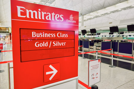 HONG KONG - SEPTEMBER 09, 2015: Emirates check-in counter design details. Emirates is the largest airline in the Middle East. It is an airline based in Dubai, United Arab Emirates.のeditorial素材