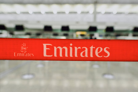 HONG KONG - SEPTEMBER 09, 2015: Emirates check-in counter design details. Emirates is the largest airline in the Middle East. It is an airline based in Dubai, United Arab Emirates.のeditorial素材
