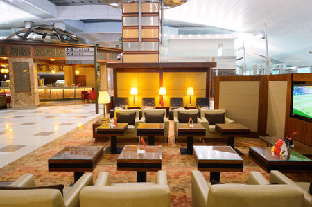 DUBAI - SEPTEMBER 08, 2015: Emirates business class lounge interior. Emirates is the largest airline in the Middle East. It is an airline based in Dubai, United Arab Emirates.のeditorial素材