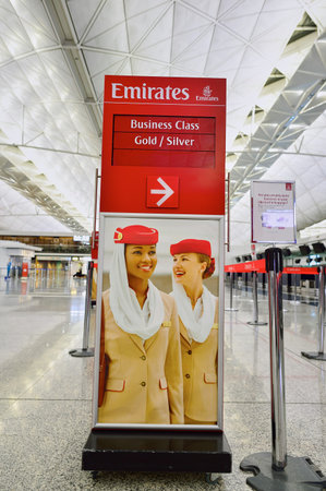 HONG KONG - SEPTEMBER 09, 2015: Emirates check-in counter design. Emirates is the largest airline in the Middle East. It is an airline based in Dubai, UAE.のeditorial素材