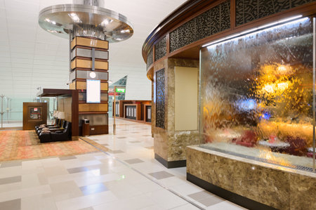 DUBAI - SEPTEMBER 08, 2015: Emirates business class lounge interior. Emirates is the largest airline in the Middle East. It is an airline based in Dubai, United Arab Emirates.のeditorial素材