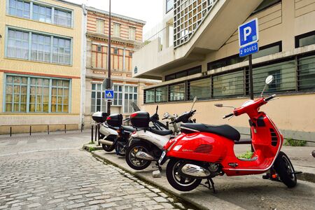 PARIS, FRANCE - AUGUST 09, 2015: modern and vintage motorbikes parked in the street of Paris. Paris,...