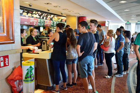 NICE, FRANCE - AUGUST 15, 2015: McDonald's restaurant interior. McDonald's is the world's largest...
