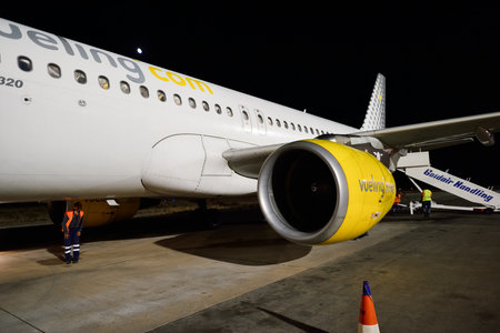 SANTORINI, GREECE - AUGUST 05, 2015: Vueling Airbus A320. Vueling Airlines, S.A. is a Spanish...