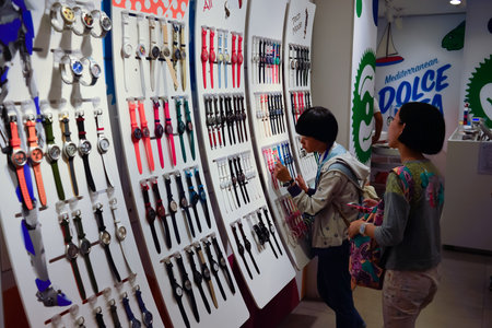 ROME, ITALY - AUGUST 16, 2015: Swatch store interior. Swatch SA design, manufacture, distribute and service wristwatches sold under the 'Swatch' and 'Flik Flak' brandsのeditorial素材