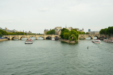 PARIS, FRANCE - AUGUST 09, 2015: tourists sail in the ship. Paris, aka City of Love, is a popular travel destination and a major city in Europeのeditorial素材
