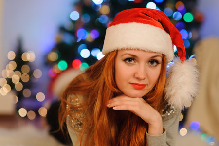 Studio shot of beautiful young woman during christmas holidaysの写真素材