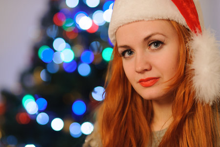 Studio shot of beautiful young woman during christmas holidaysの写真素材