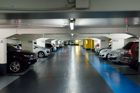 NICE, FRANCE - AUGUST 15, 2015: underground parking. A multi-storey car park is a building designed for car parking and where there are a number of floors or levels on which parking takes placeのeditorial素材