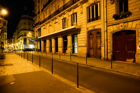 PARIS, FRANCE - AUGUST 11, 2015: Paris streets at night. Paris, aka City of Love, is a popular travel destination and a major city in Europeのeditorial素材