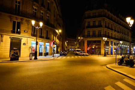 PARIS, FRANCE - AUGUST 11, 2015: Paris streets at night. Paris, aka City of Love, is a popular travel destination and a major city in Europeのeditorial素材