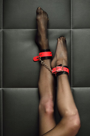 Close up shot of woman's bounded legs