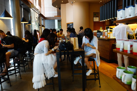 SHENZHEN, CHINA - OCTOBER 15, 2015: Starbucks Cafe interior. Starbucks Corporation is an American global coffee company and coffeehouse chain based in Seattle, Washingtonのeditorial素材