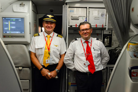 PRAGUE, CZECK REPUBLICK - AUGUST 16, 2015: pilots of Czech Airlines after flight. CSA Czech Airlines...