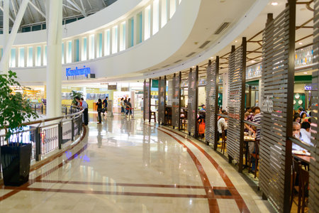 KUALA LUMPUR, MALAYSIA - APRIL 23, 2014: Suria KLCC shopping mall in Petronas Twin Towers. Suria KLCC is one of the largest shopping malls in Malaysiaのeditorial素材