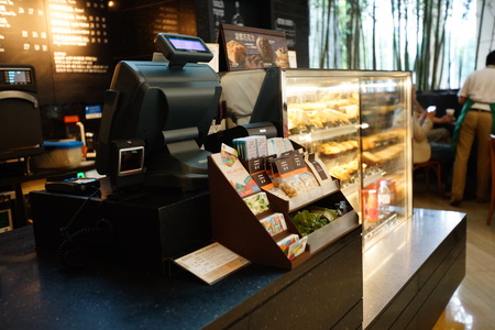 SHENZHEN, CHINA - OCTOBER 15, 2015: Starbucks Cafe interior. Starbucks Corporation is an American...