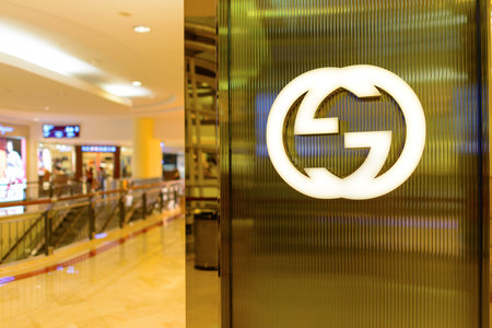 KUALA LUMPUR, MALAYSIA - APRIL 23, 2014: Gicci logo on the wall. Gucci is an Italian fashion and...