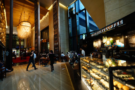 SHENZHEN, CHINA - OCTOBER 15, 2015: Starbucks Cafe interior. Starbucks Corporation is an American global coffee company and coffeehouse chain based in Seattle, Washingtonのeditorial素材