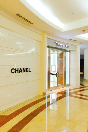 KUALA LUMPUR, MALAYSIA - APRIL 23, 2014: Tiffany&Co and Chanel stores exterior in Suria KLCC shopping mall. Suria KLCC is one of the largest shopping malls in Malaysiaのeditorial素材