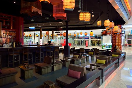 DUBAI, UAE - SEPTEMBER 08, 2015: restaurant in Dubai Airport. There are a lot of restaurants, bars, cafes and shops in Dubai International Airport. Almost all of them are open twenty-four hours.のeditorial素材
