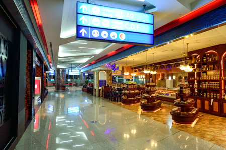 DUBAI, UAE - SEPTEMBER 08, 2015: Dubai Airport interior. There are a lot of restaurants, bars, cafes and shops in Dubai International Airport. Almost all of them are open twenty-four hours.のeditorial素材