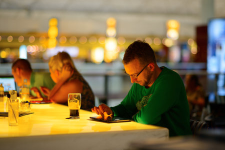 HONG KONG - APRIL 22, 2014: passenger in Hong Kong International Airport. Hong Kong International Airport is the main airport in Hong Kong. It is located on the island of Chek Lap Kokのeditorial素材