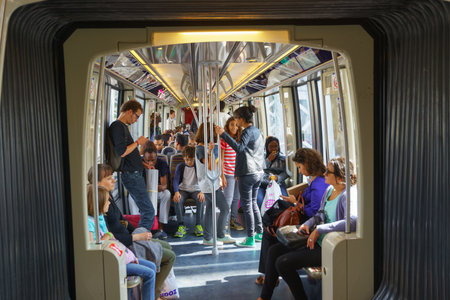 PARIS - SEPTEMBER 10, 2014: passengers in Paris Metropolitain train. The Paris Metro or...