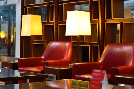 DUBAI, UAE - NOVEMBER 16, 2015: Emirates business class lounge interior. Emirates is the largest airline in the Middle East. It is an airline based in Dubai, United Arab Emirates.のeditorial素材