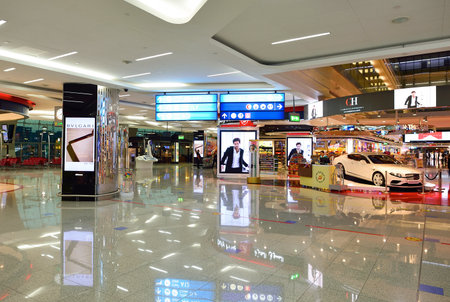 DUBAI, UAE - NOVEMBER 21, 2015: interior of Dubai Airport. Dubai International Airport is the world's busiest airport by international passenger traffic.のeditorial素材
