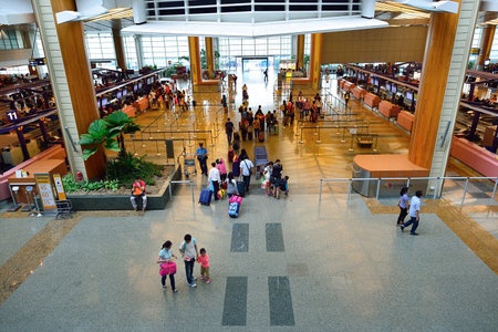 SINGAPORE - NOVEMBER 09, 2015: check-in zone at Changi Airport. Singapore Changi Airport, is the primary civilian airport for Singapore, and one of the largest transportation hubs in Southeast Asiaのeditorial素材