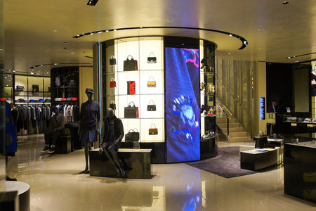 SINGAPORE - NOVEMBER 08, 2015: interior of Armani store. Giorgio Armani is an Italian fashion house founded by Giorgio Armaniのeditorial素材