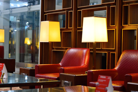 DUBAI, UAE - NOVEMBER 16, 2015: Emirates business class lounge interior. Emirates is the largest airline in the Middle East. It is an airline based in Dubai, United Arab Emirates.のeditorial素材