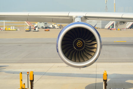 Part of wing and engine of modern jet flight