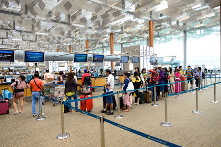 SINGAPORE - NOVEMBER 09, 2015: check-in zone at Changi Airport. Singapore Changi Airport, is the...