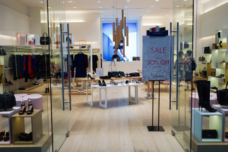 SINGAPORE - NOVEMBER 08, 2015: interior of Nine West store in The Shoppes at Marina Bay Sands. Nine West, also 9 West, is a fashion wholesale and retail company.のeditorial素材