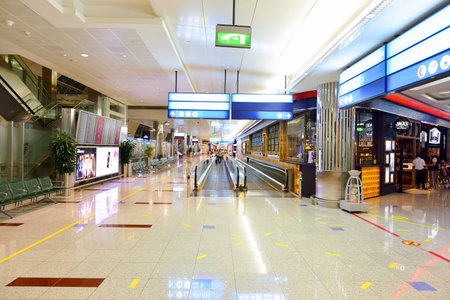 DUBAI, UAE - SEPTEMBER 08, 2015: interior of Dubai Airport. Dubai International Airport is the world's busiest airport by international passenger traffic.のeditorial素材