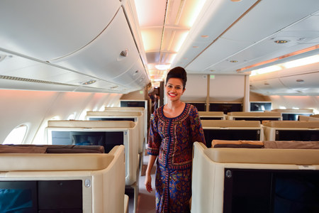 SINGAPORE - NOVEMBER 03, 2015: Singapore Airlines crew member on board of Airbus A380. Singapore...