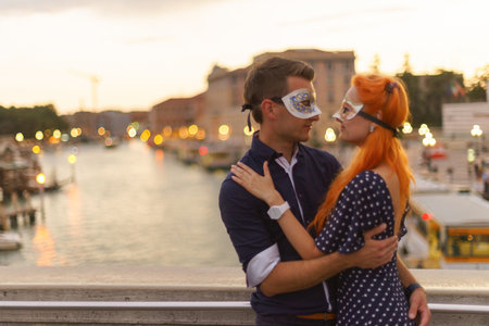 Young couple dating on the bridge in center of Venice.の写真素材