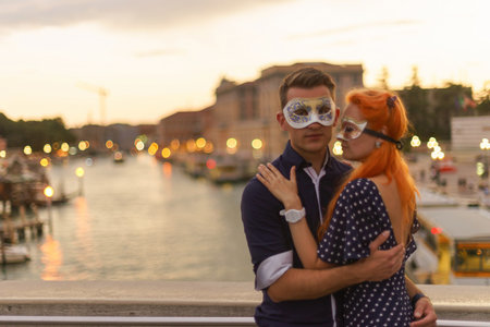 Young couple dating on the bridge in center of Venice.の写真素材