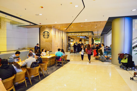 HONG KONG - DECEMBER 25, 2015: interior of Starbucks cafe. Starbucks Corporation is an American global coffee company and coffeehouse chain based in Seattle, Washingtonのeditorial素材
